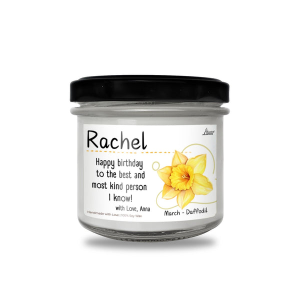 a jar of happy birthday candle with daffodils