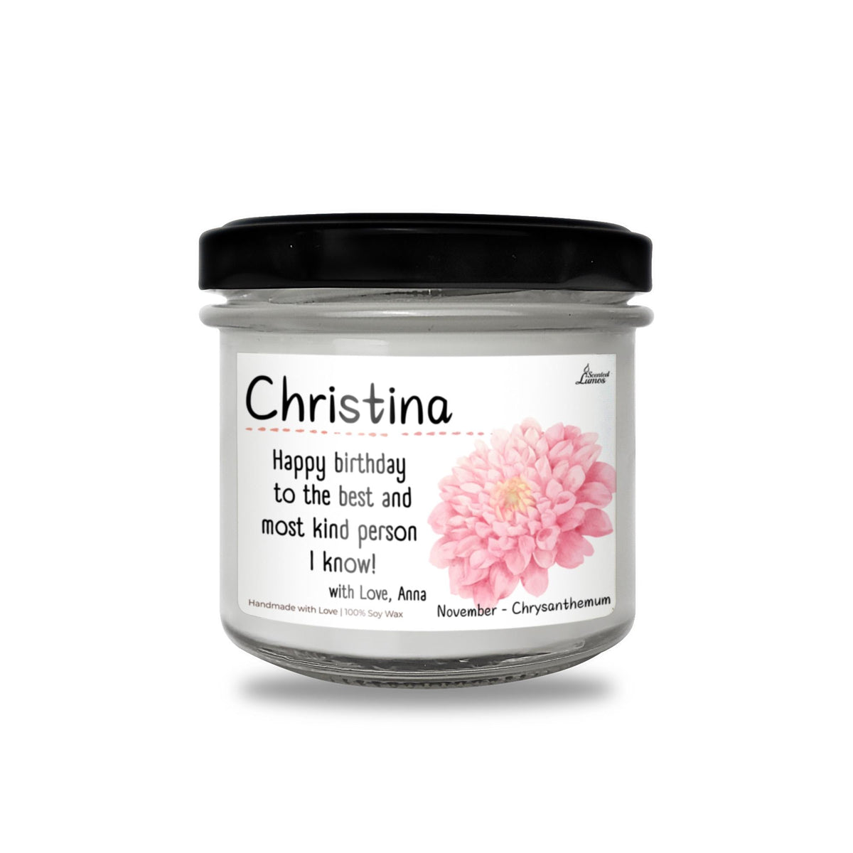a jar of birthday candles with a pink flower
