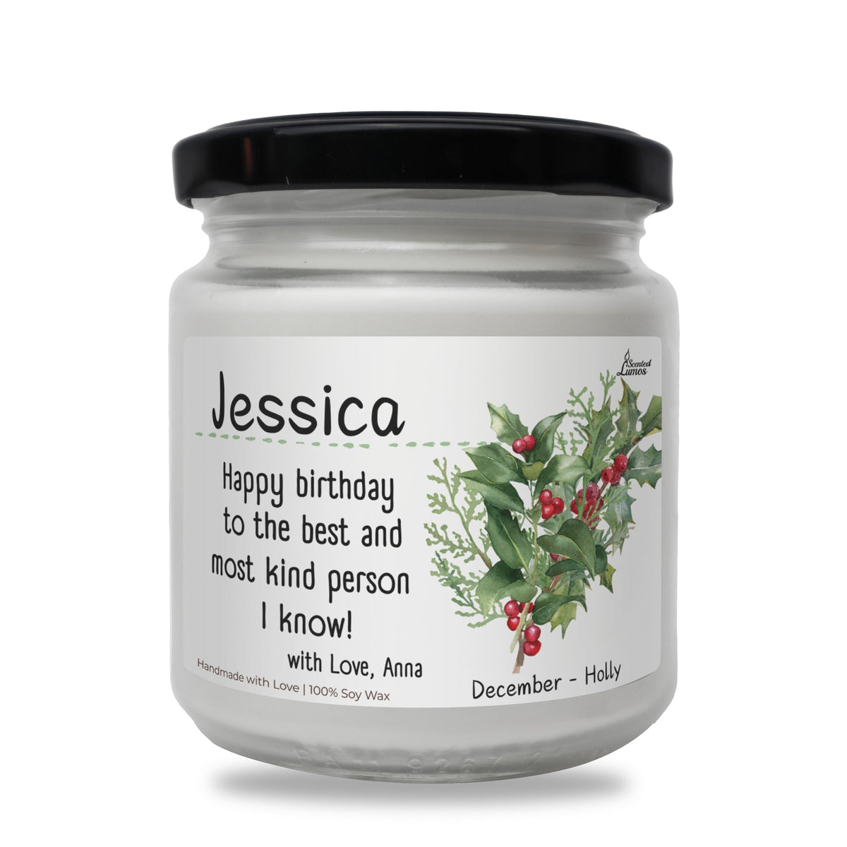 a jar of candles with holly and berries on it