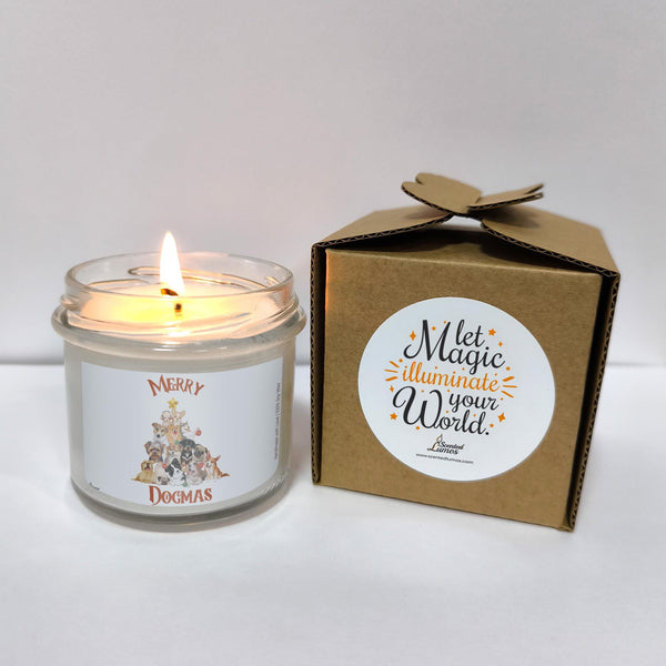 a white candle sitting next to a brown box