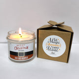 a candle is sitting next to a box