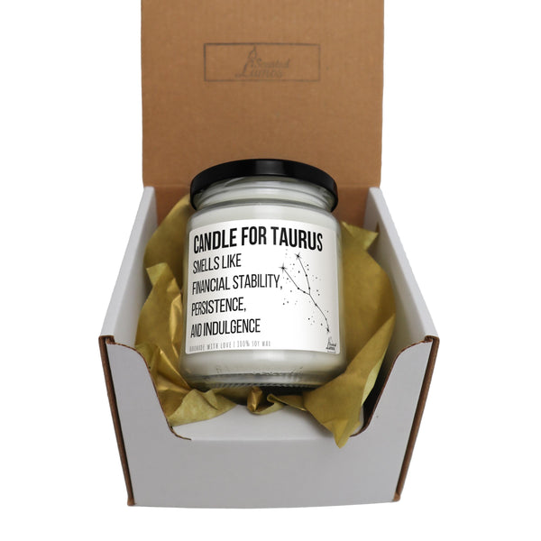 a candle for taurus in a gift box