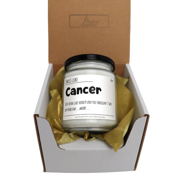 a jar of cancer sits in a cardboard box