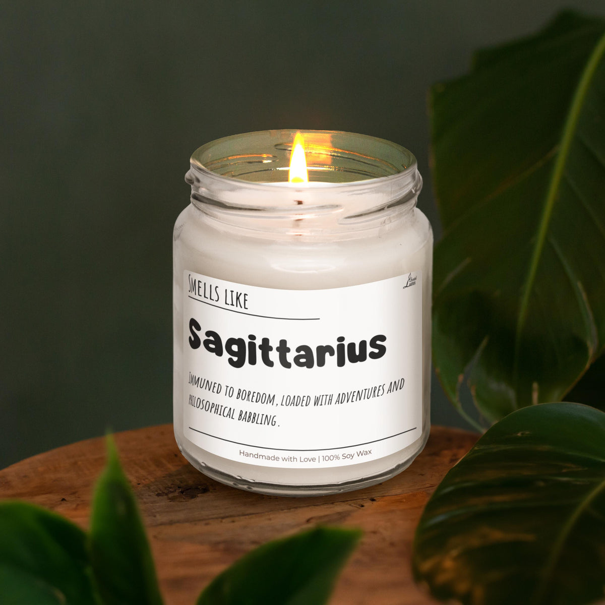 a jar of sagittarius sitting on top of a wooden table