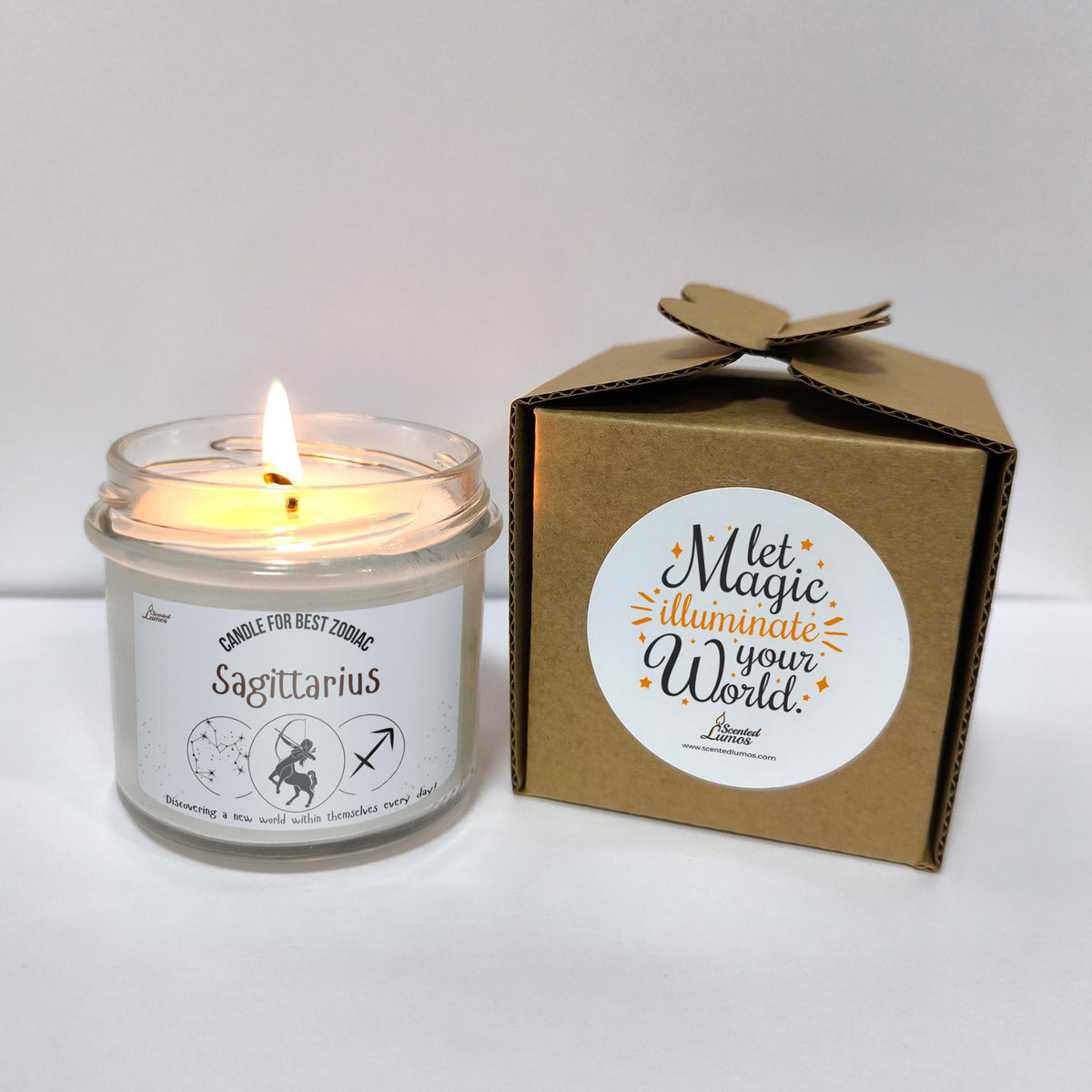 a candle is sitting next to a box