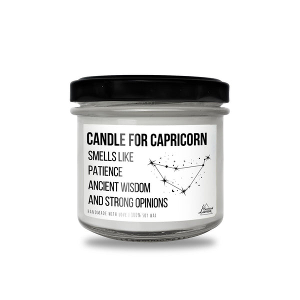 a jar of candle that says candle for capricorn