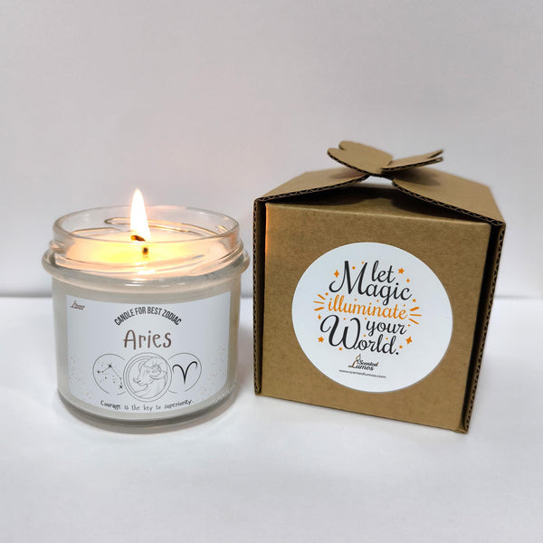 a candle is sitting next to a box