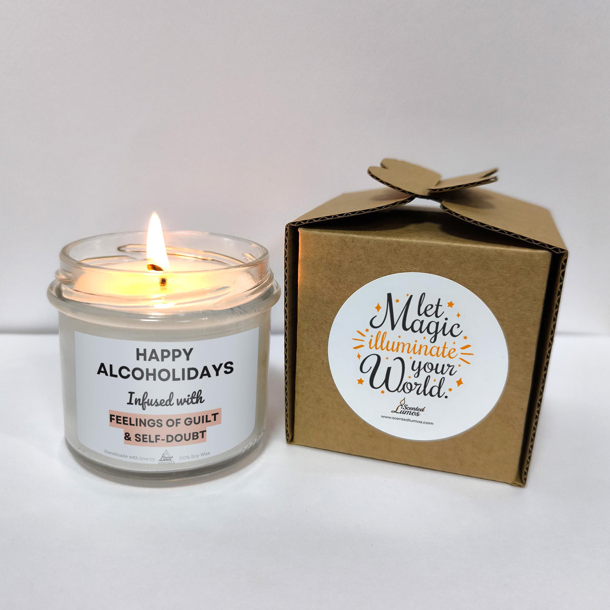 a candle that is sitting next to a box