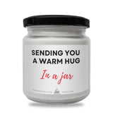 a jar with a message on it that says sending you a warm hug