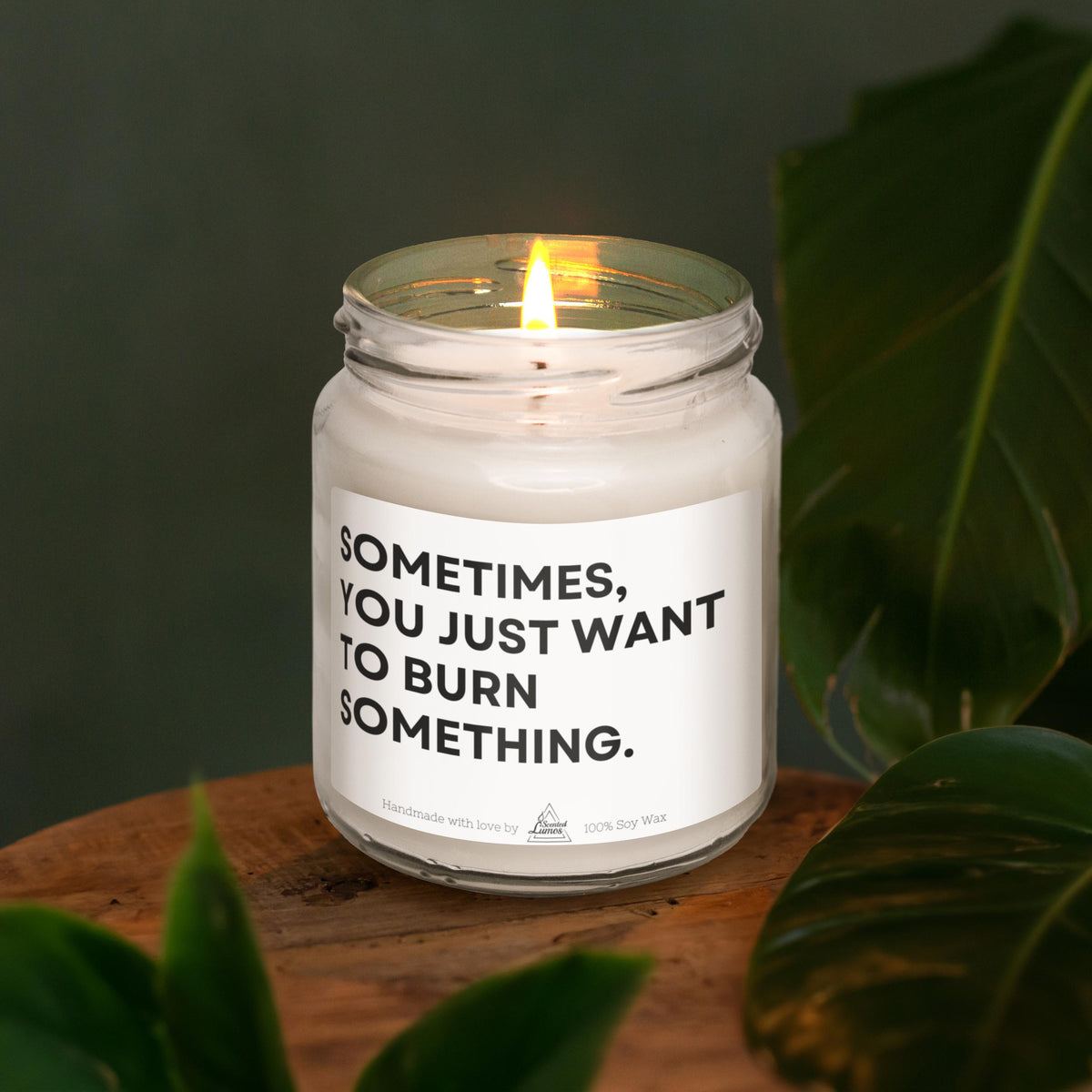 a candle sitting on top of a wooden table