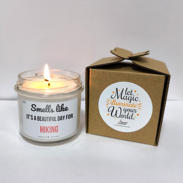 a candle that is sitting next to a box