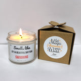 a candle that is next to a box