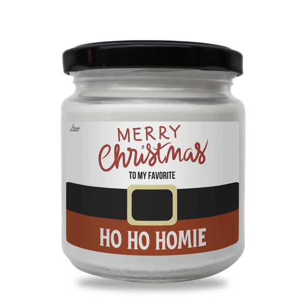 a jar of christmas candy with a santa hat on it