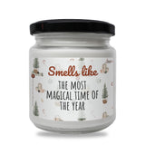 a white jar with a black lid that says smell like the most magic time of