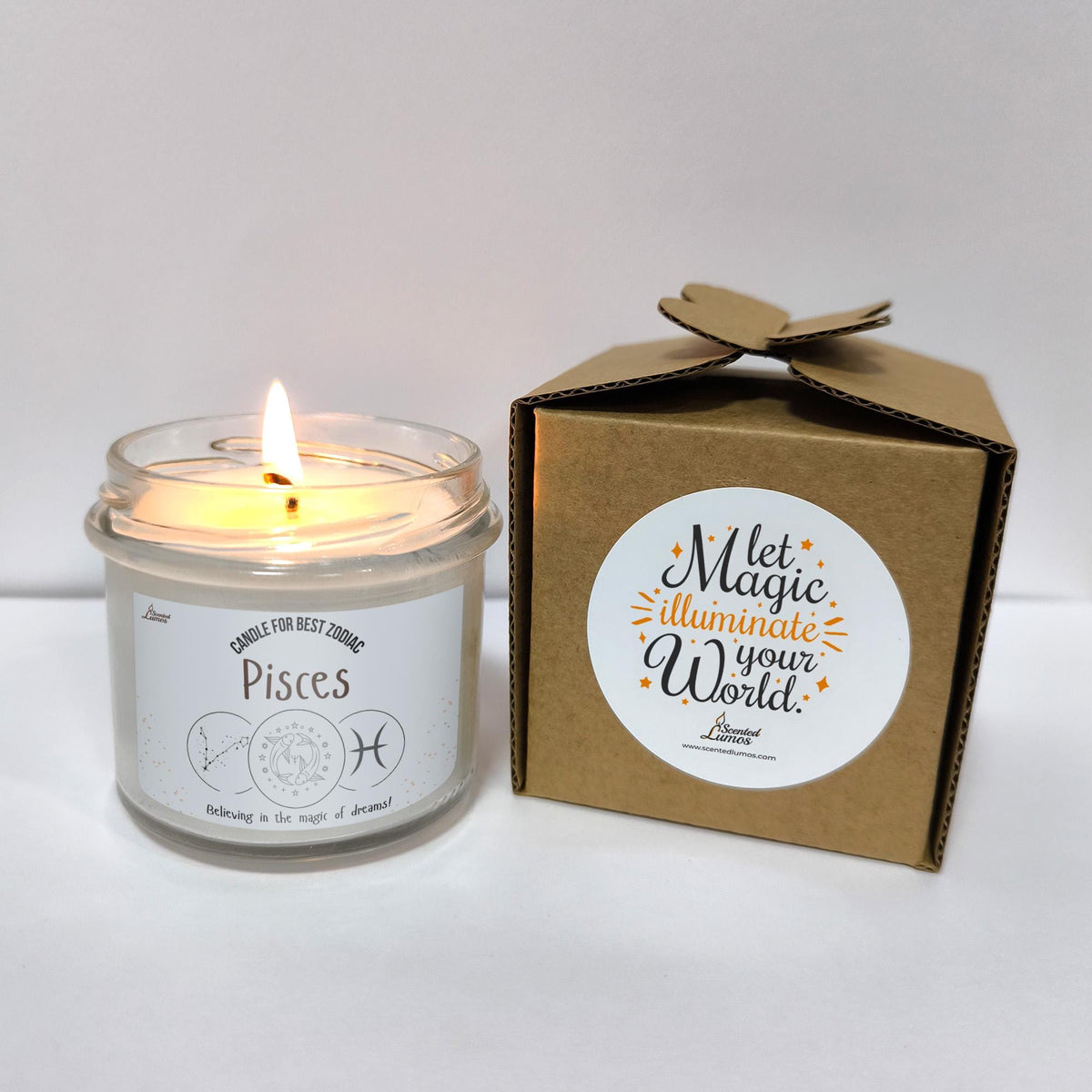 a candle is sitting next to a box