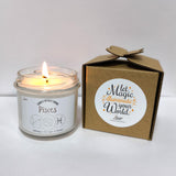 a candle is sitting next to a box