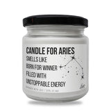 a jar of candle for aries smells like born for winner filled with unsto