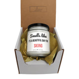 a small jar of cream sitting inside of a box